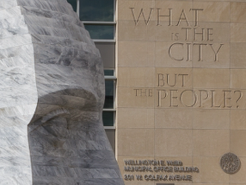 Denver municipal building inscribed What is the city but the people?